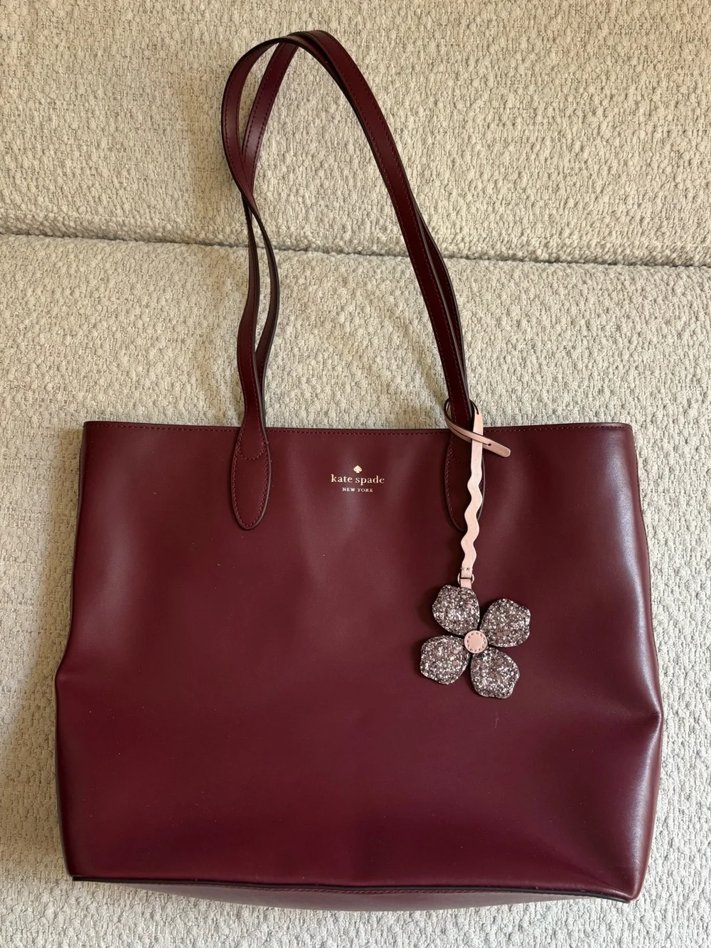 kate spade Burgundy Leather Tote with Floral Charm